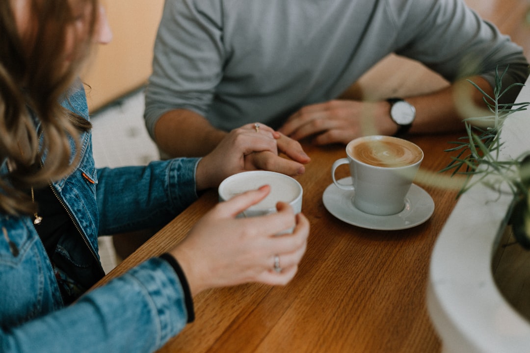 People engaged in supportive conversation